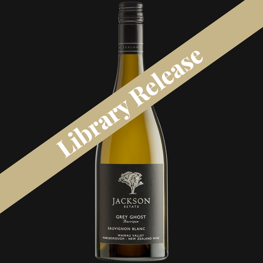Jackson Estate Grey Ghost Barrique Sauvignon Blanc bottle against a dark background, overlaid with a diagonal "Library Release" banner.